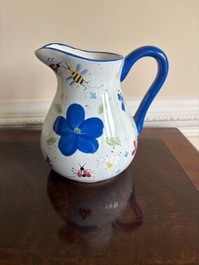 Hand-Painted Floral Pitcher with Blue Handle